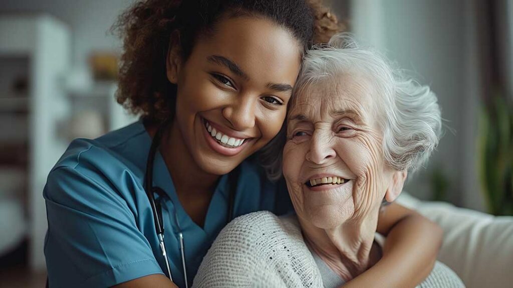 A senior speaking with a caregiver while using a cane in a well-lit, clutter-free living space.